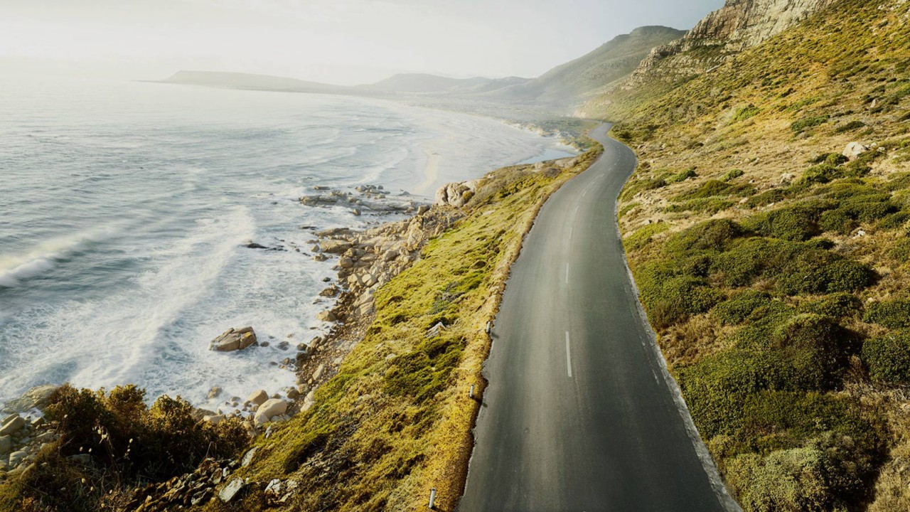 A road next to the ocean